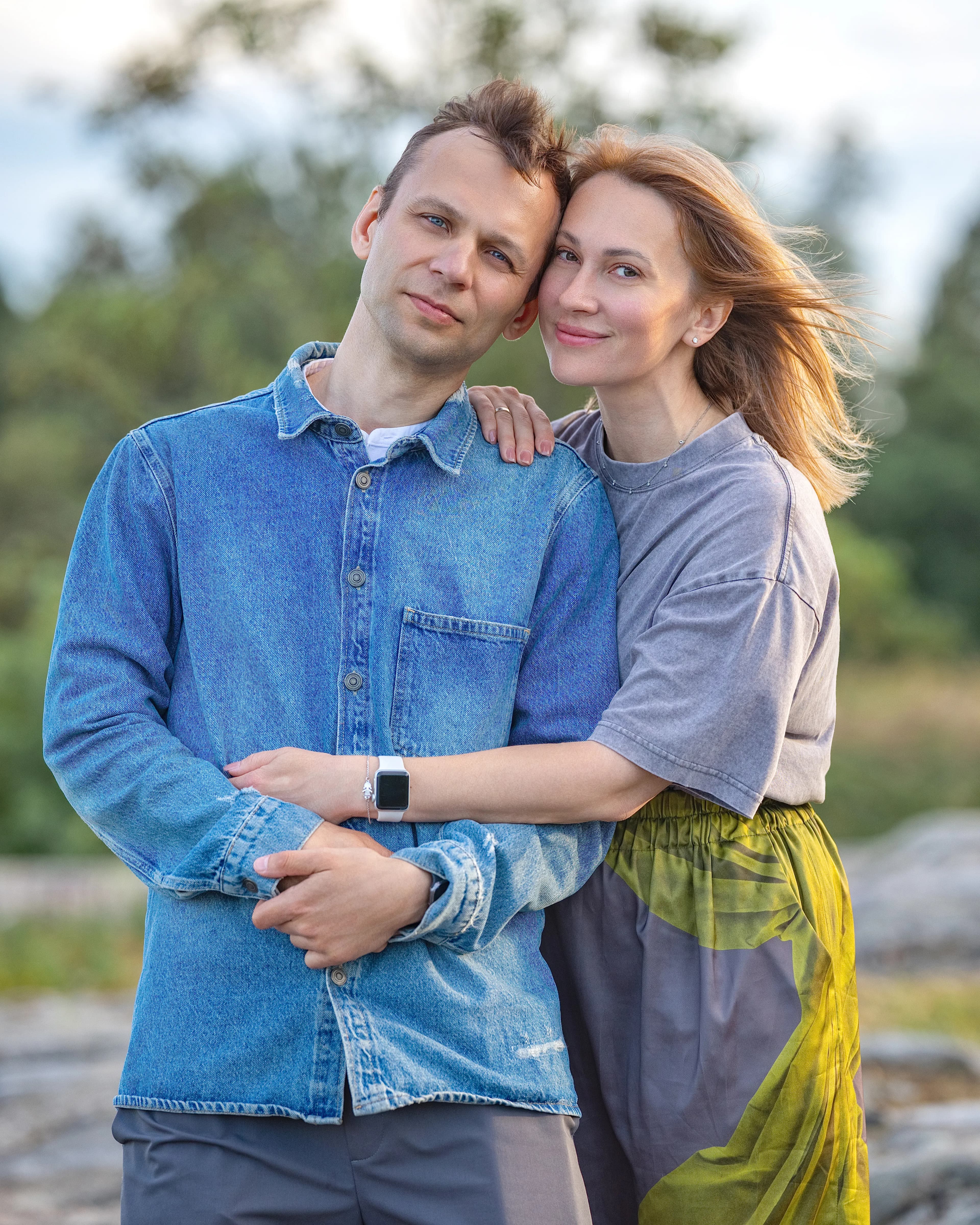 Sunset couple portrait denim shirt field