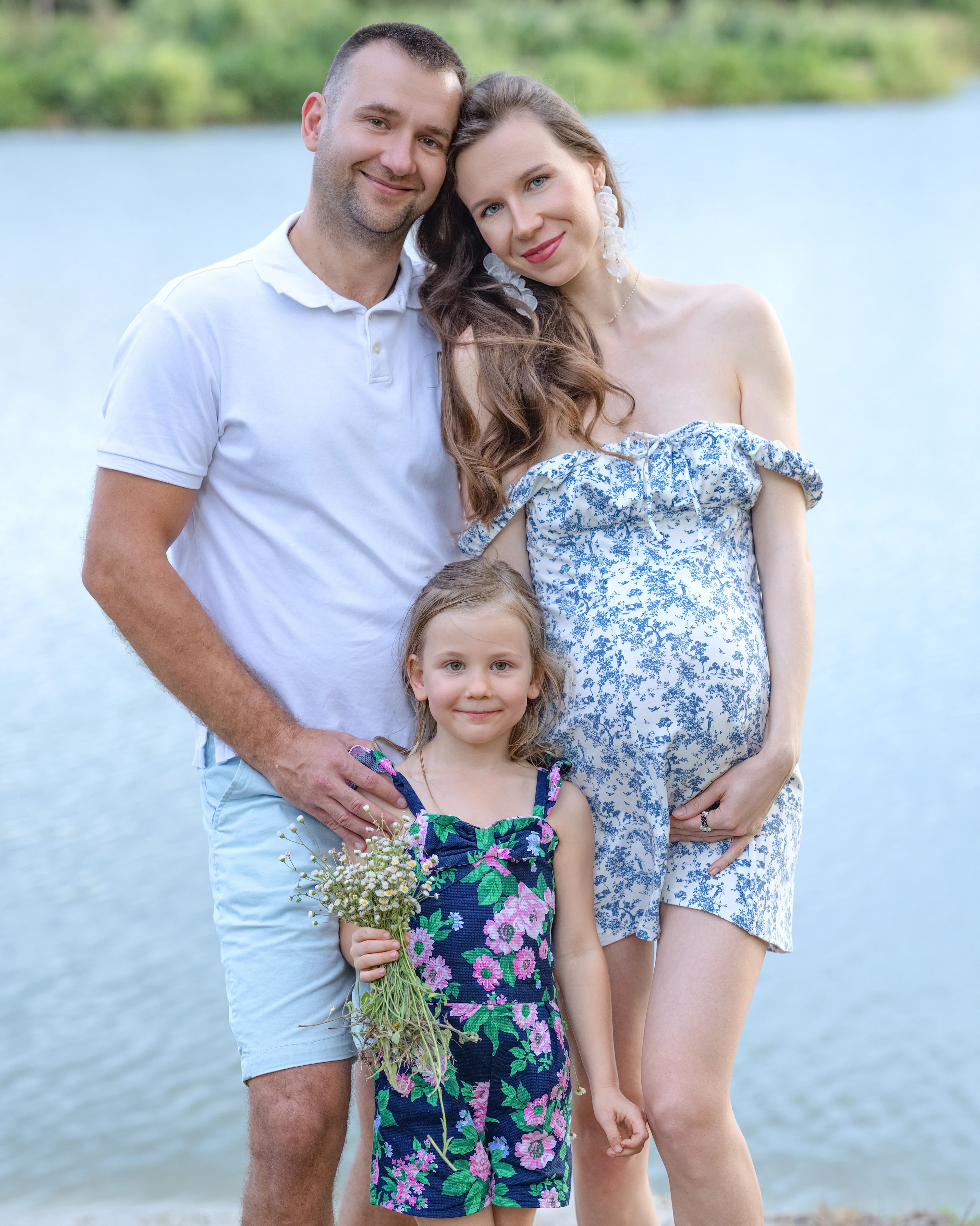 Outdoor family maternity photo lake floral dress