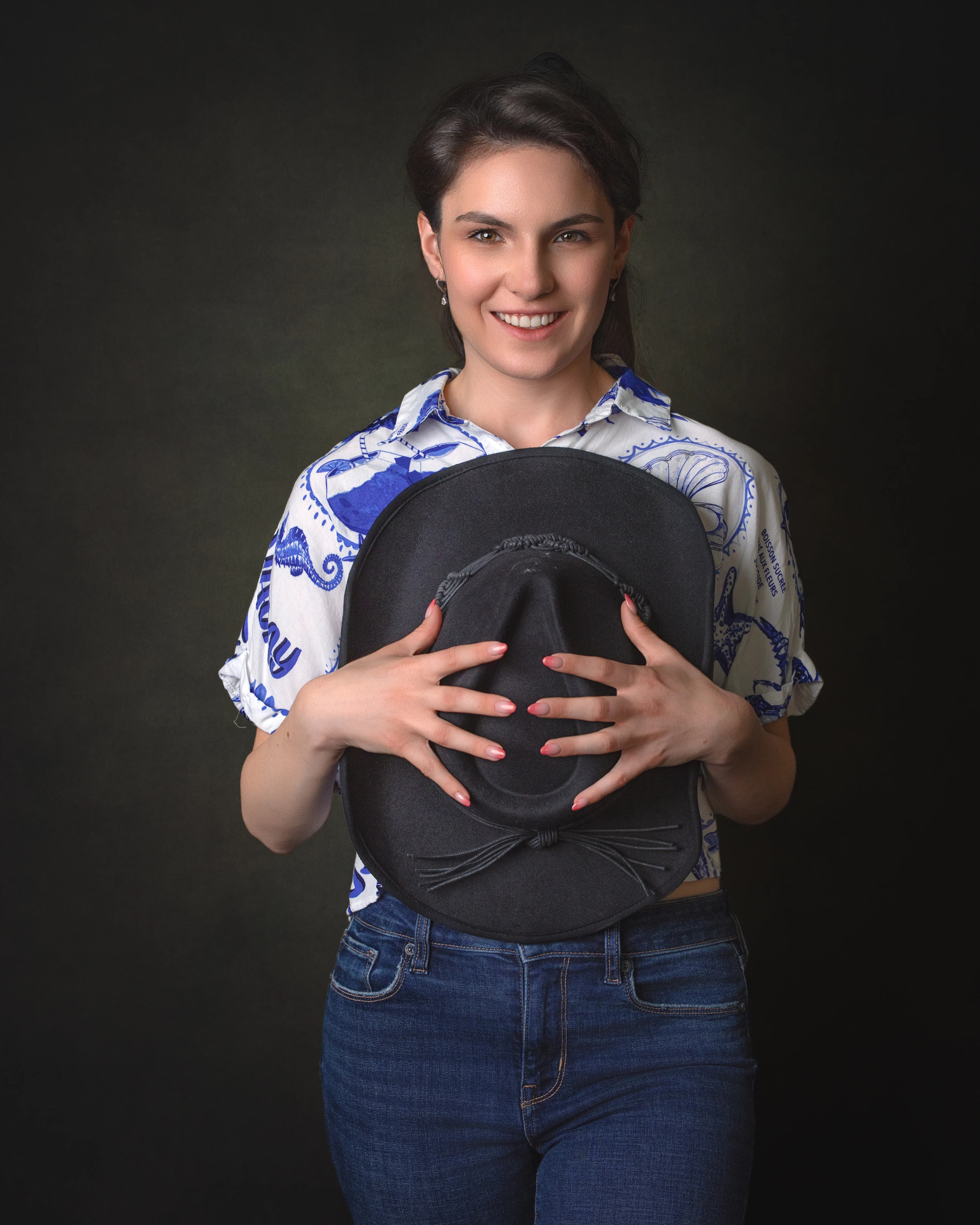 Sarasota studio portrait woman holding hat